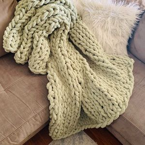 Hand knitted chunky chenille solid one color throws. TEAM colored throws, also.
